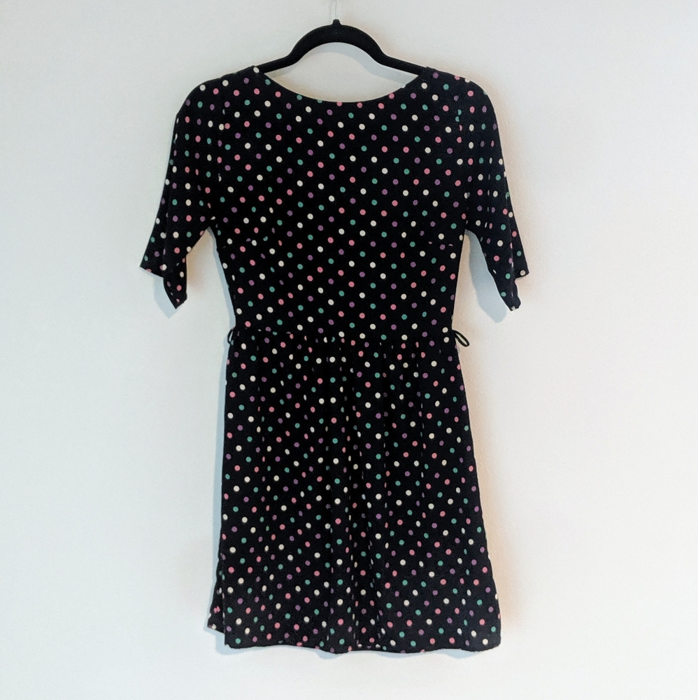 Navy blue dress with colorful polka dots